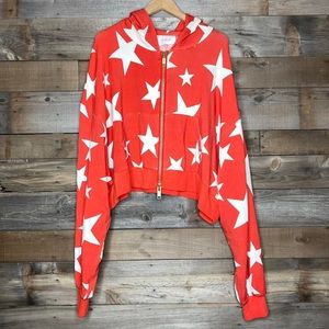 Selkie cropped, oversized star pillow zip up in size large.